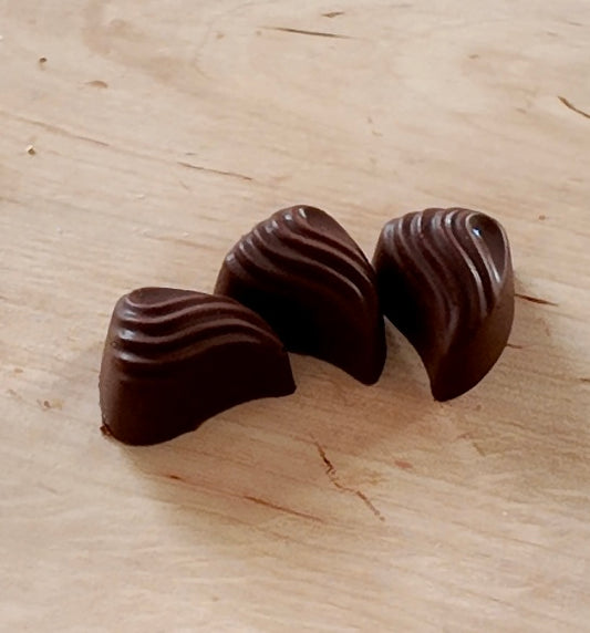 Bonbon chocolat lait et praliné noix de coco